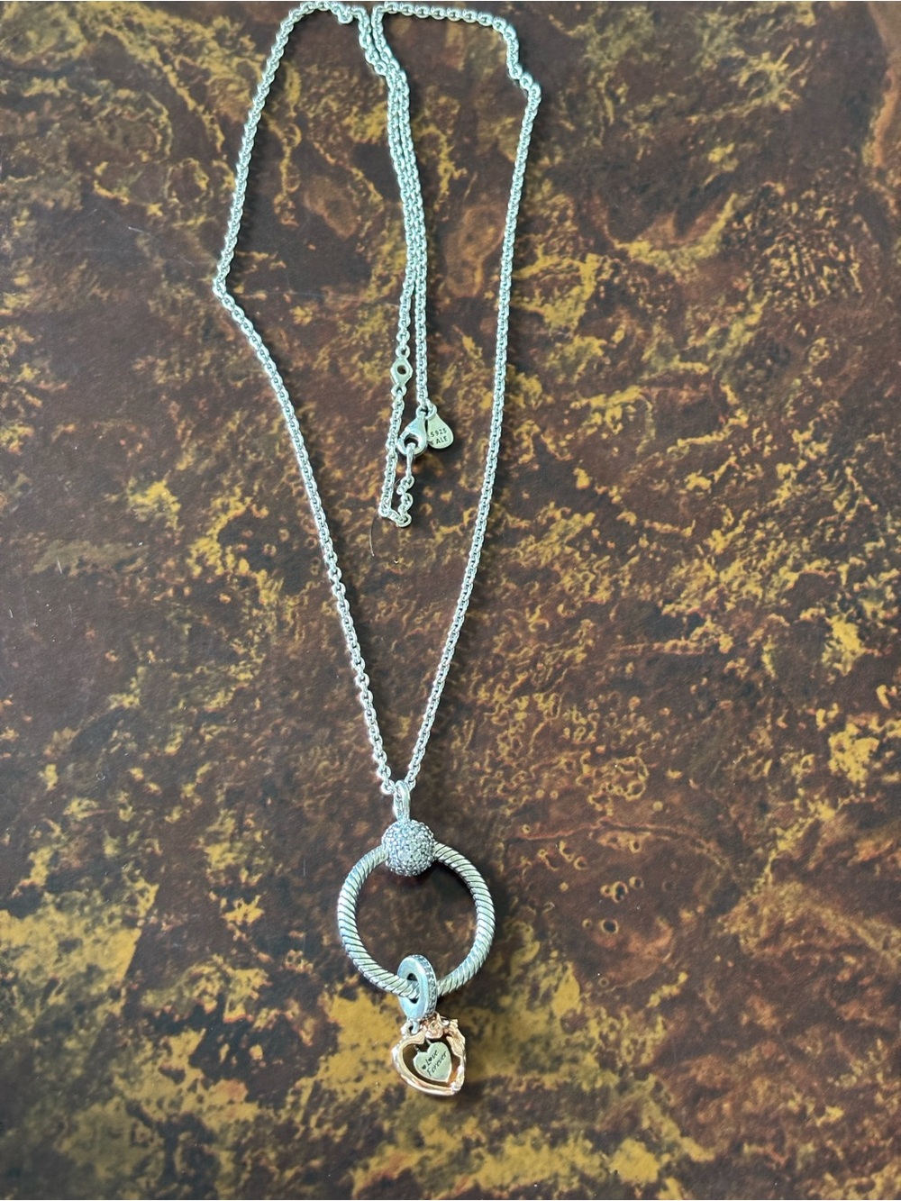 Pandora charm necklace with rose gold charm